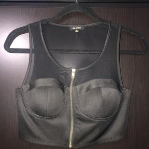 Black crop top. Zipper front. Mesh. Size. Medium